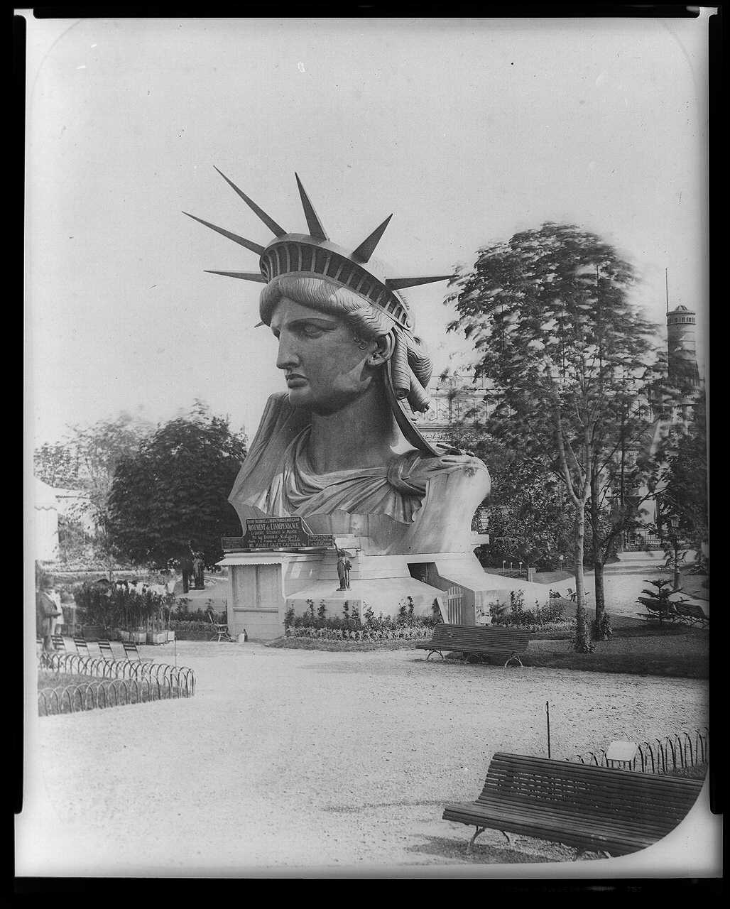 head-of-statue-of-liberty-on-display-in-park-in-paris